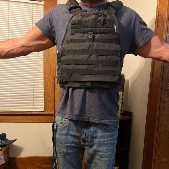 Black tactical ballistic vest.  Does not have plates in it. - Picture 2 of 5